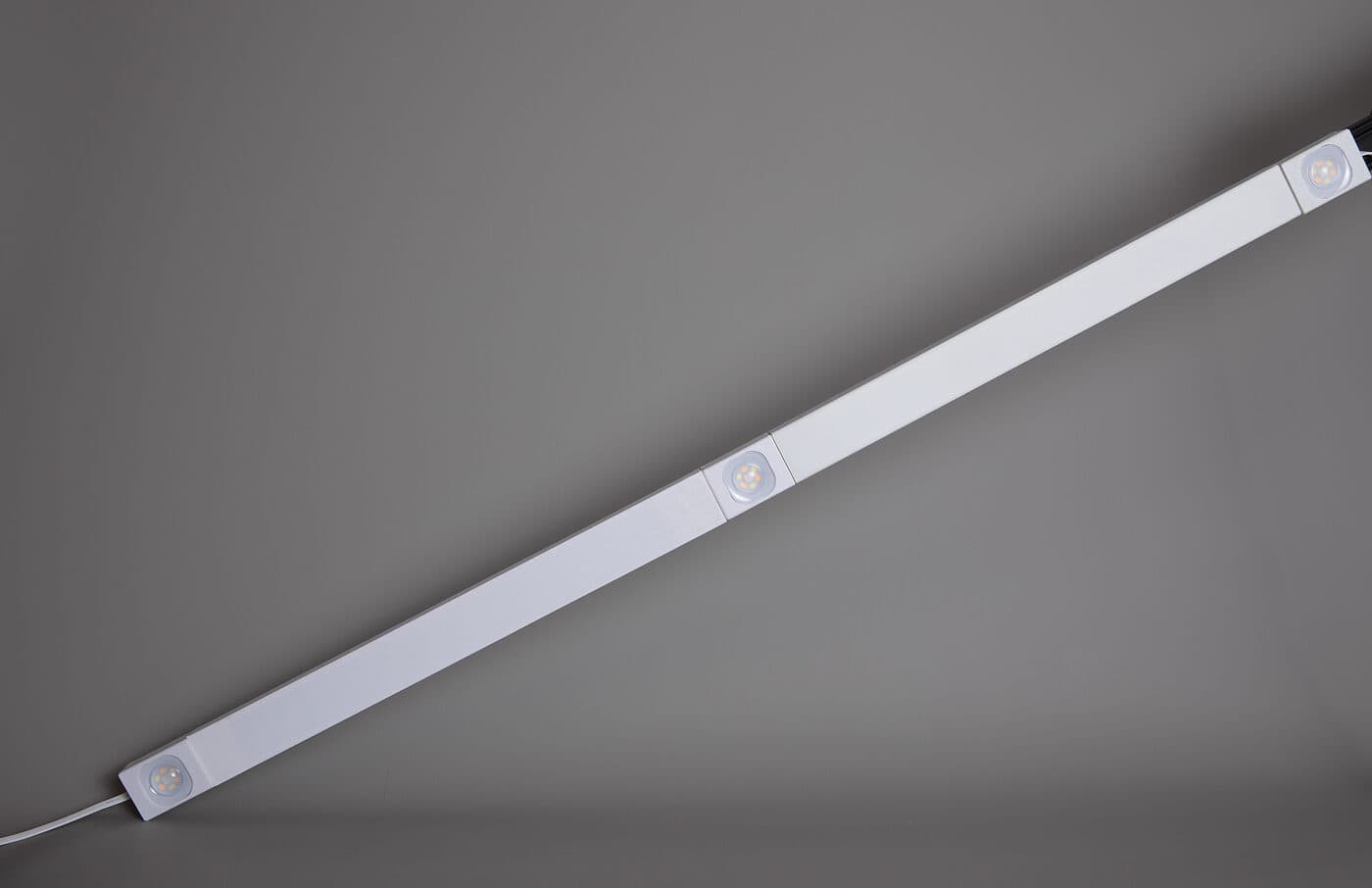 Assembled GeauxTrax track with three LED pucks installed